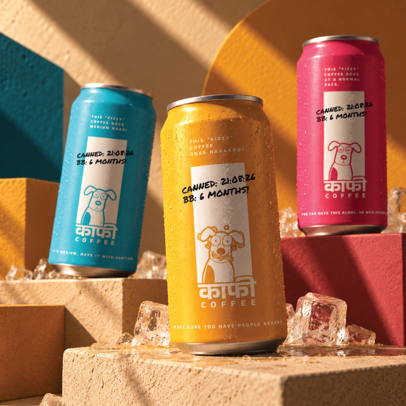 Three Kaafi cans in teal, yellow and pink with hand-written date stamps