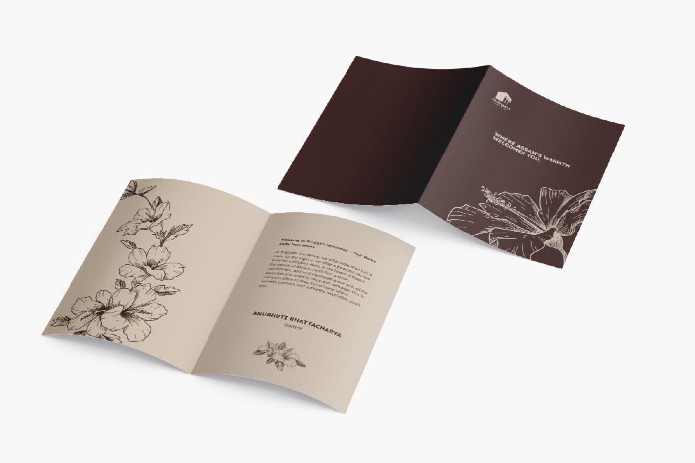 Open Trishakti brochure with flower illustrations